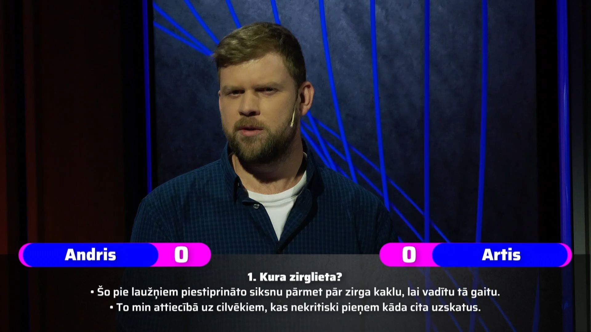 Erudīcijas spēlē "15 jautājumi" sacenšas Andris Spricis un Artis Miķelsons